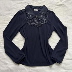 Axes Femme navy long sleeve top with collar and embroidered bib